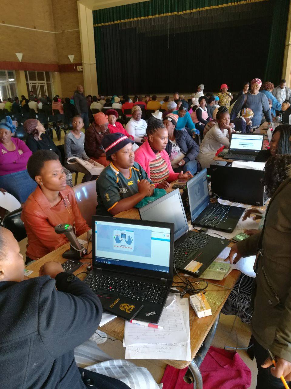 South African person verifying biometric ID for June 2025 payments at a local office, SASSA Identity Verification Required for June 2025 Payments